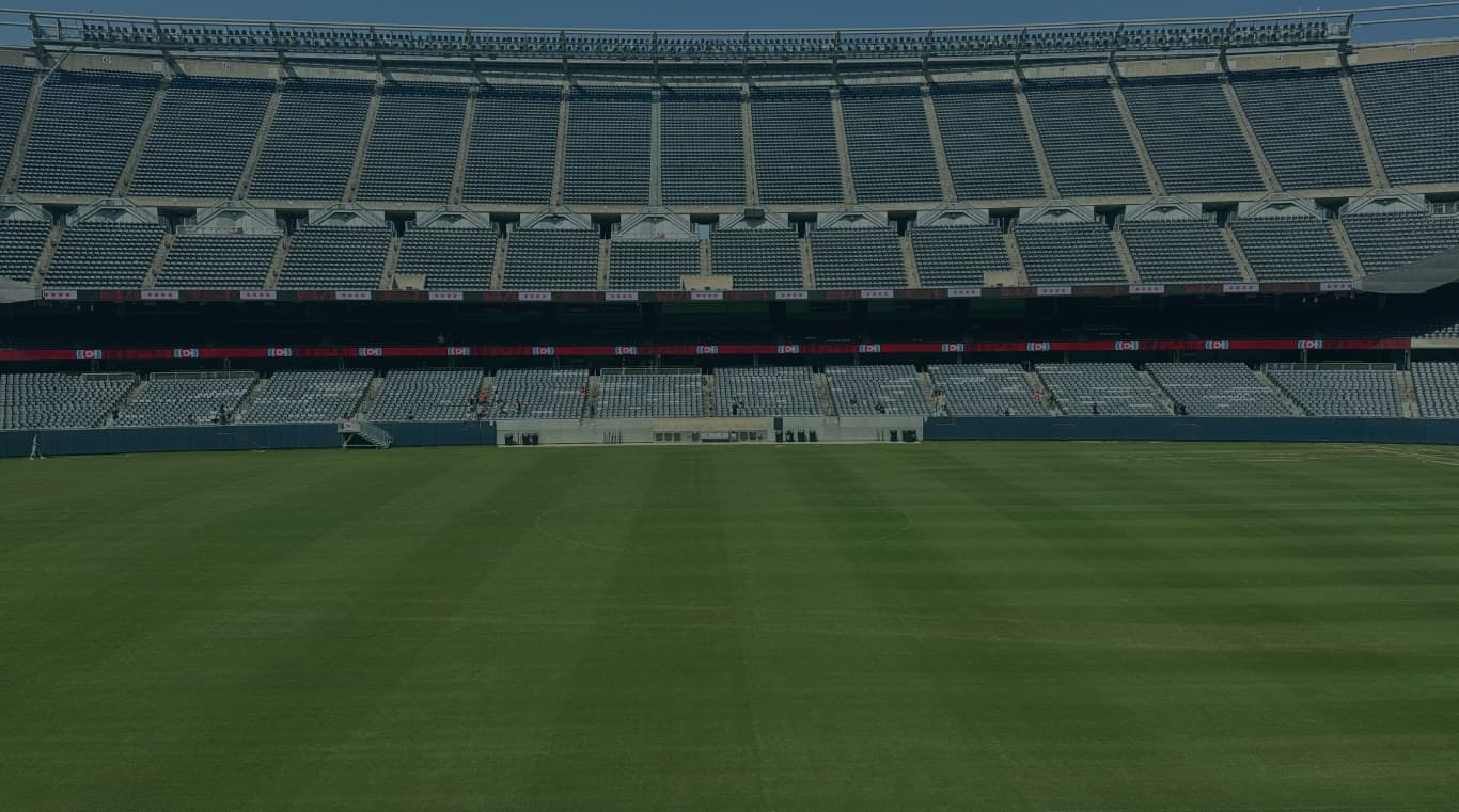 The empty stands and pitch, seen from section 209